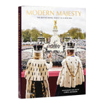 Book titled 'Modern Majesty' featuring a photograph of two individuals in formal attire with a crowd and a clock tower in the background.