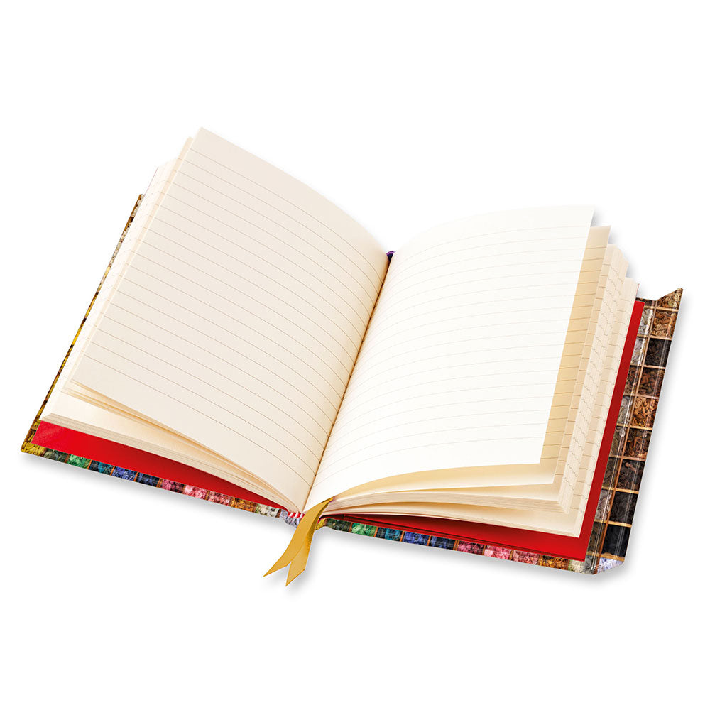 Open notebook with decorative cover on a white background