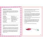 Recipe book page for raspberry crumbles with a spoonful of crumble on a pink background