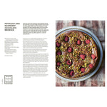 Pistachio and raspberry chocolate brownie in a baking dish with text on the left side.