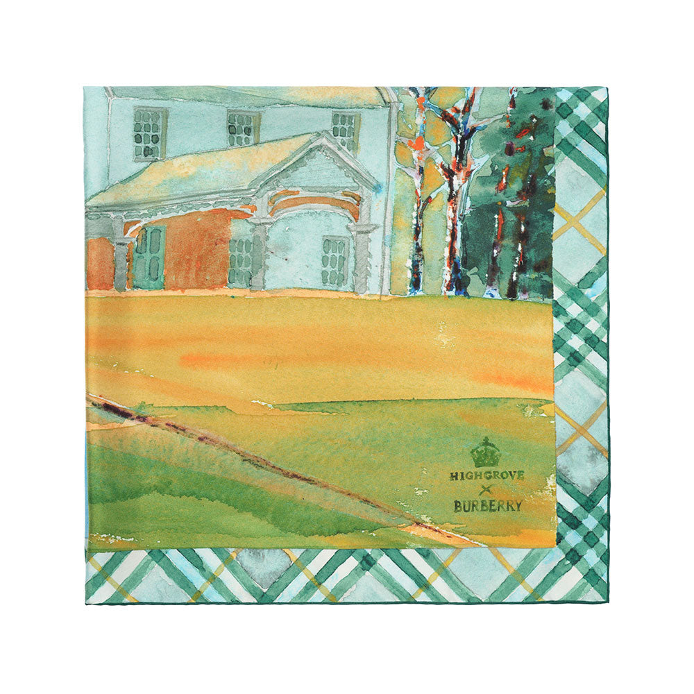 A corner of a Burberry plaid silk scarf featuring a part of an illustrated representation of Birkhall, set against a white background.