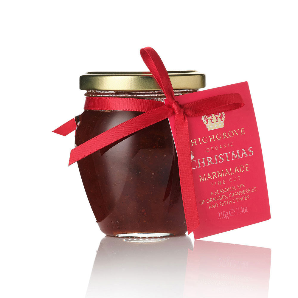 Jar of Highgrove Christmas Marmalade with a red ribbon and tag on a white background