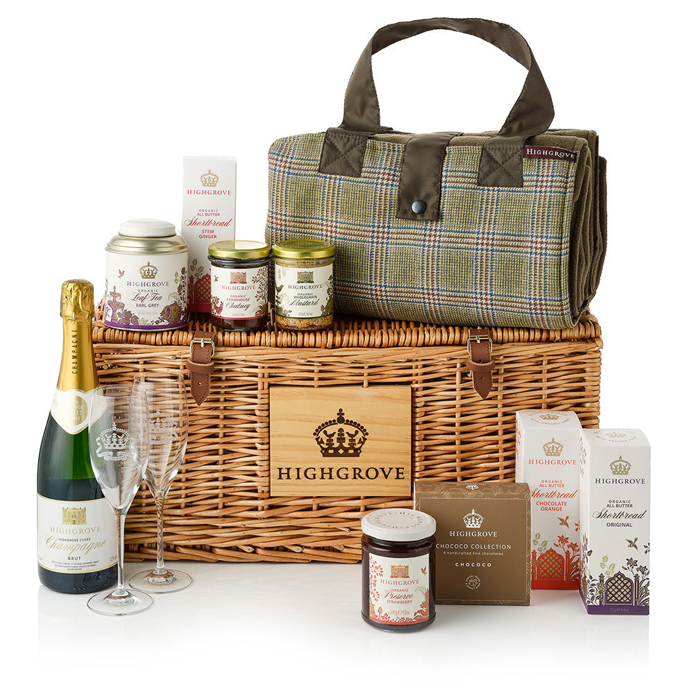 Highgrove garden party hamper with wine, snacks, and a blanket on a white background