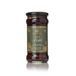 A glass jar of Highgrove What a Pickle: blackberries, rhubarb and blackcurrants, featuring a dark olive green label with gold lettering and a black lid, set against a clean white background with a soft reflection.