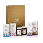 Highgrove gift set featuring a large gold box, a box of organic tea, a box of biscuits, two jars of preserves, and two boxes of honey, arranged on a white background.