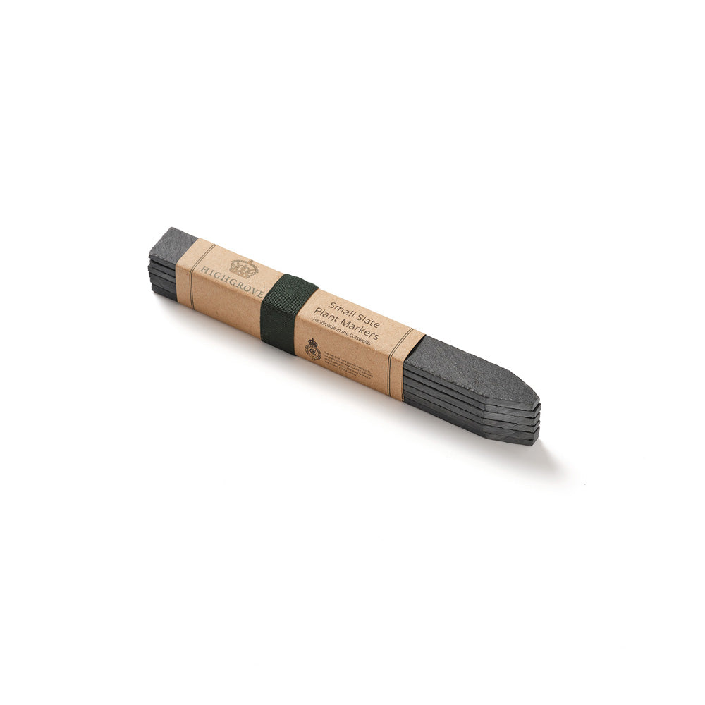 A bundle of dark gray garden slate markers wrapped in a kraft paper band and a green ribbon, shown on a clean white background.