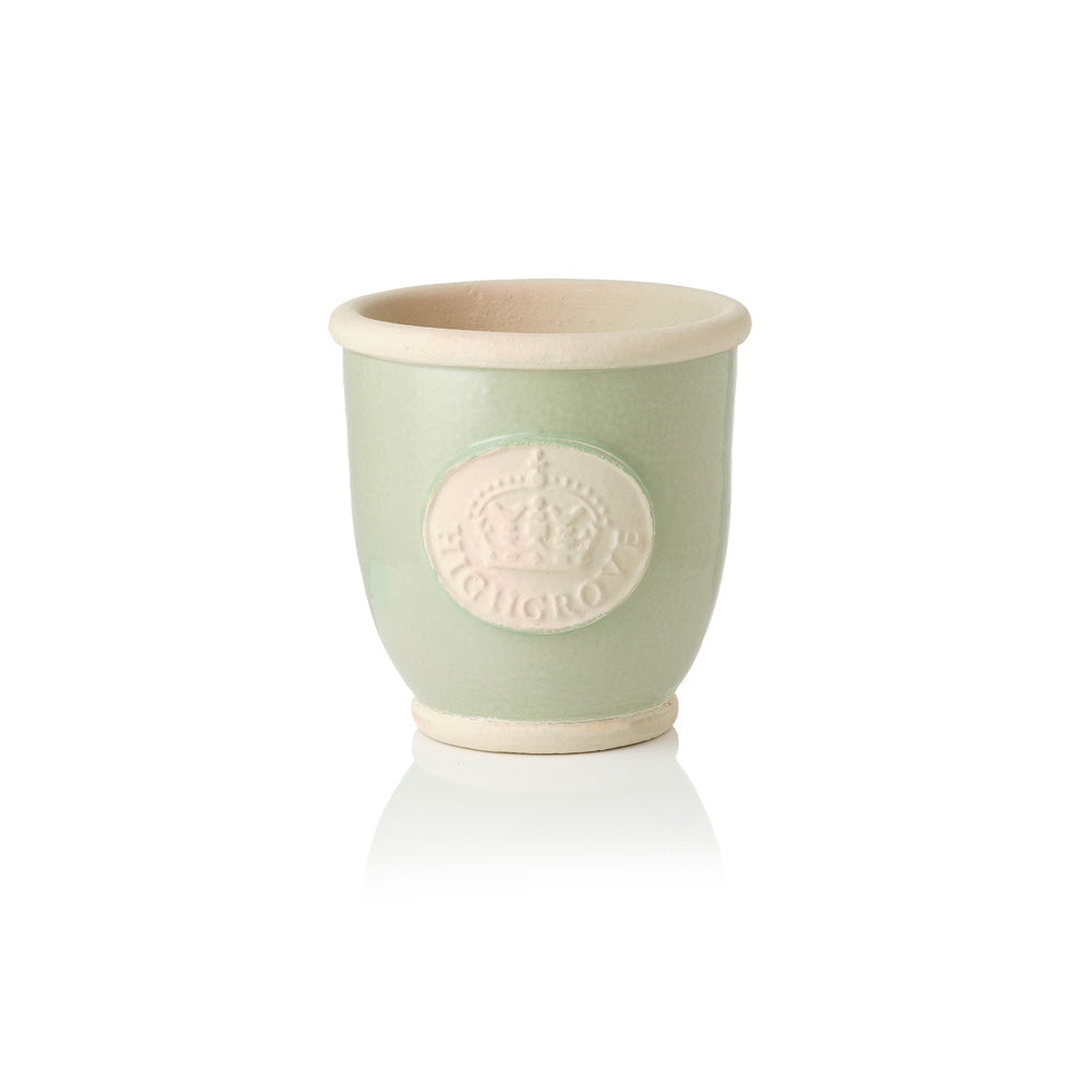 Green ceramic plant pot with a beige rim and Highgrove logo on a white background