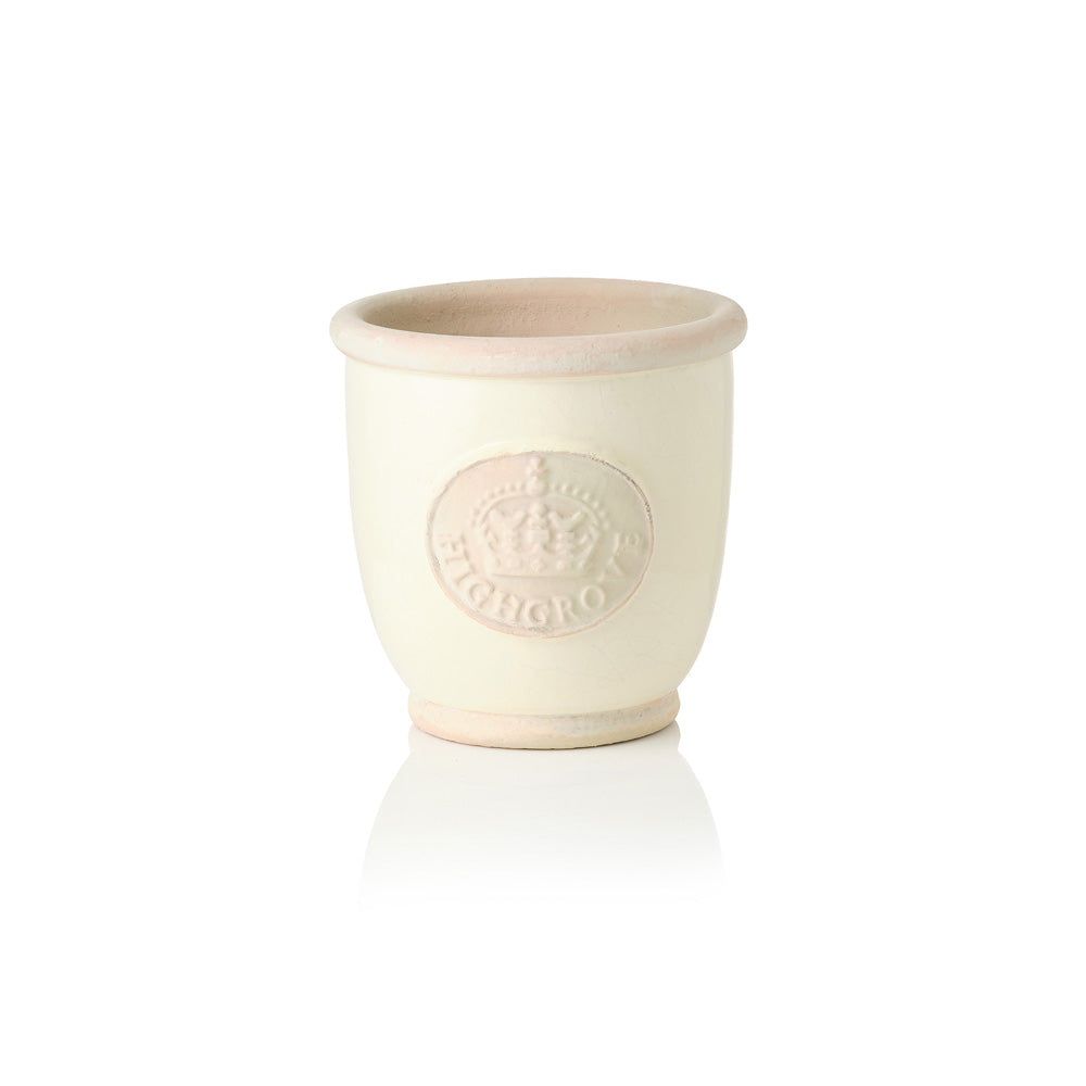 White ceramic plant pot with a beige rim and Highgrove logo on a white background