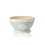 Blue ceramic footed bowl plant pot with a beige rim and Highgrove logo on a white background