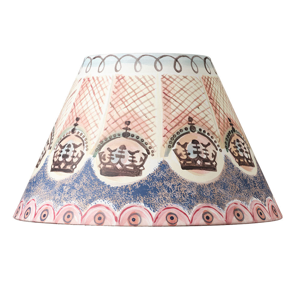 Decorative lampshade with crown patterned design on a white background