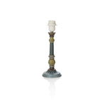 Decorative rustic looking lamp base on a white background