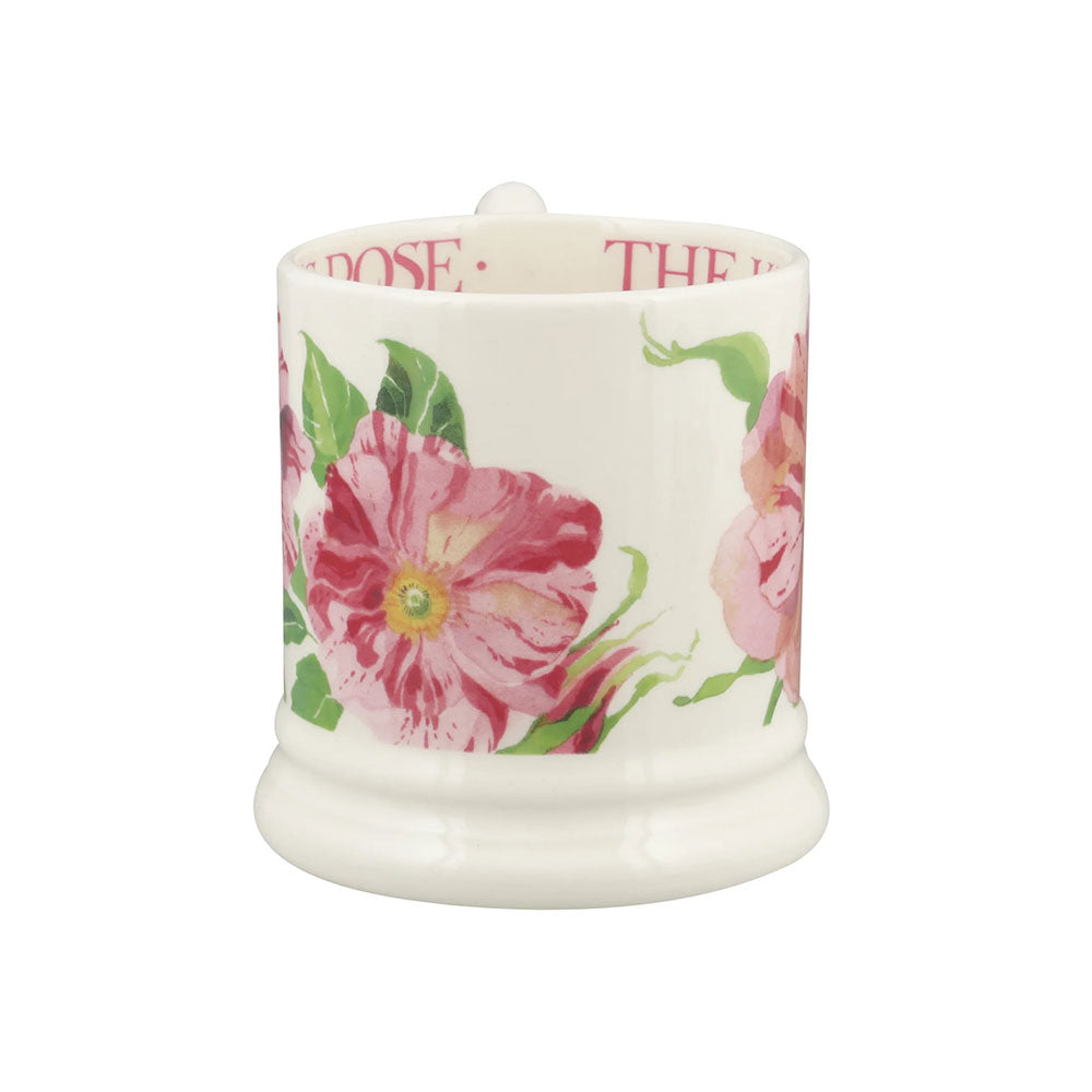 Floral-patterned mug with pink roses on a white background