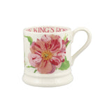 Floral mug with 'The King's Rose' branding on a white background