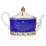 Teapot with coronation design and text on a white background