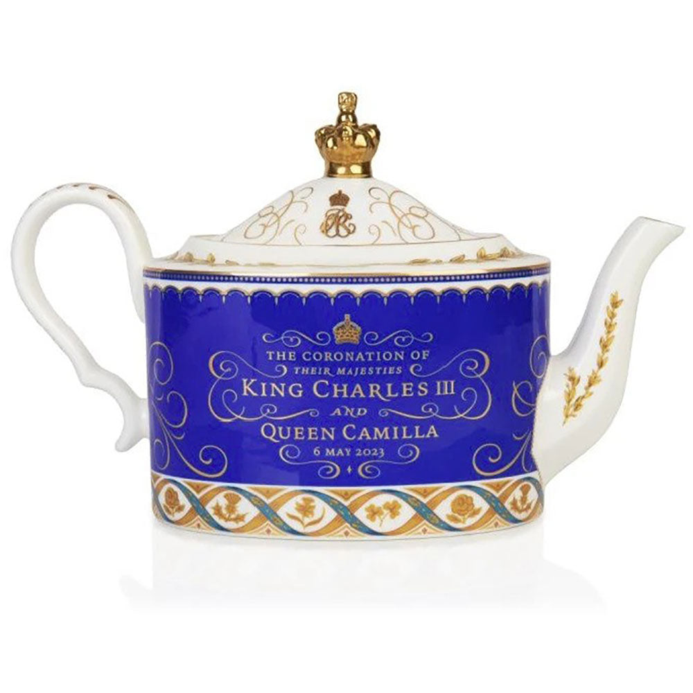 Teapot with coronation design and text on a white background