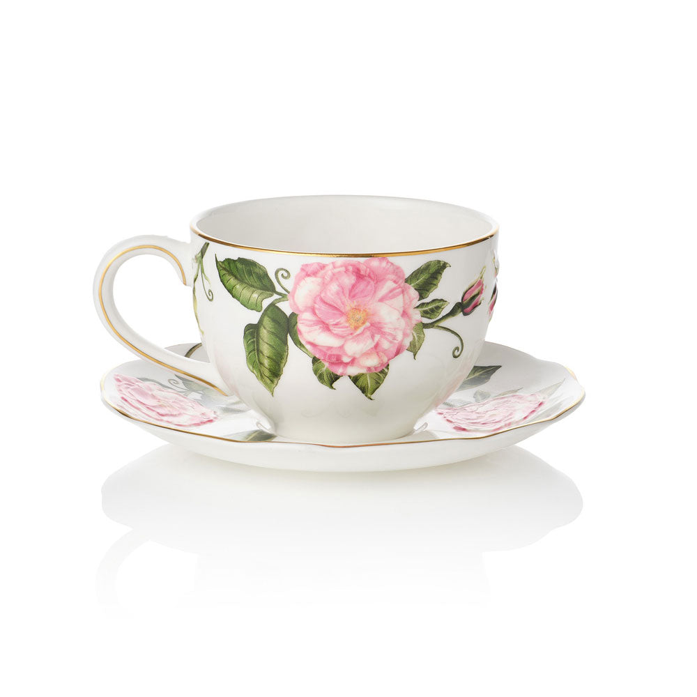 Teacup and saucer with The King's Rose floral design on a white background