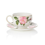 Teacup and saucer with The King's Rose floral design on a white background