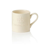 Cream-coloured ceramic mug with 'Highgrove' branding on a white background