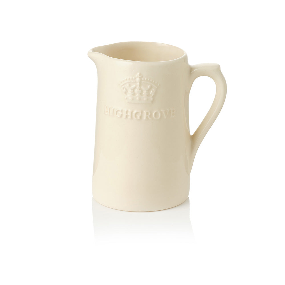 Cream-colored ceramic jug with 'Highgrove' branding on a white background