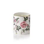 Rose-patterned candle on a white background