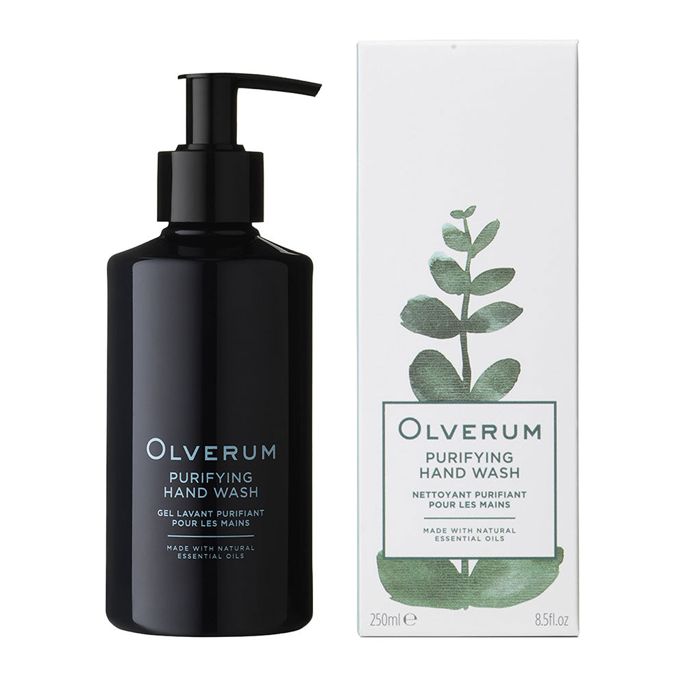 Black hand wash bottle with pump and packaging featuring eucalyptus design on a white background